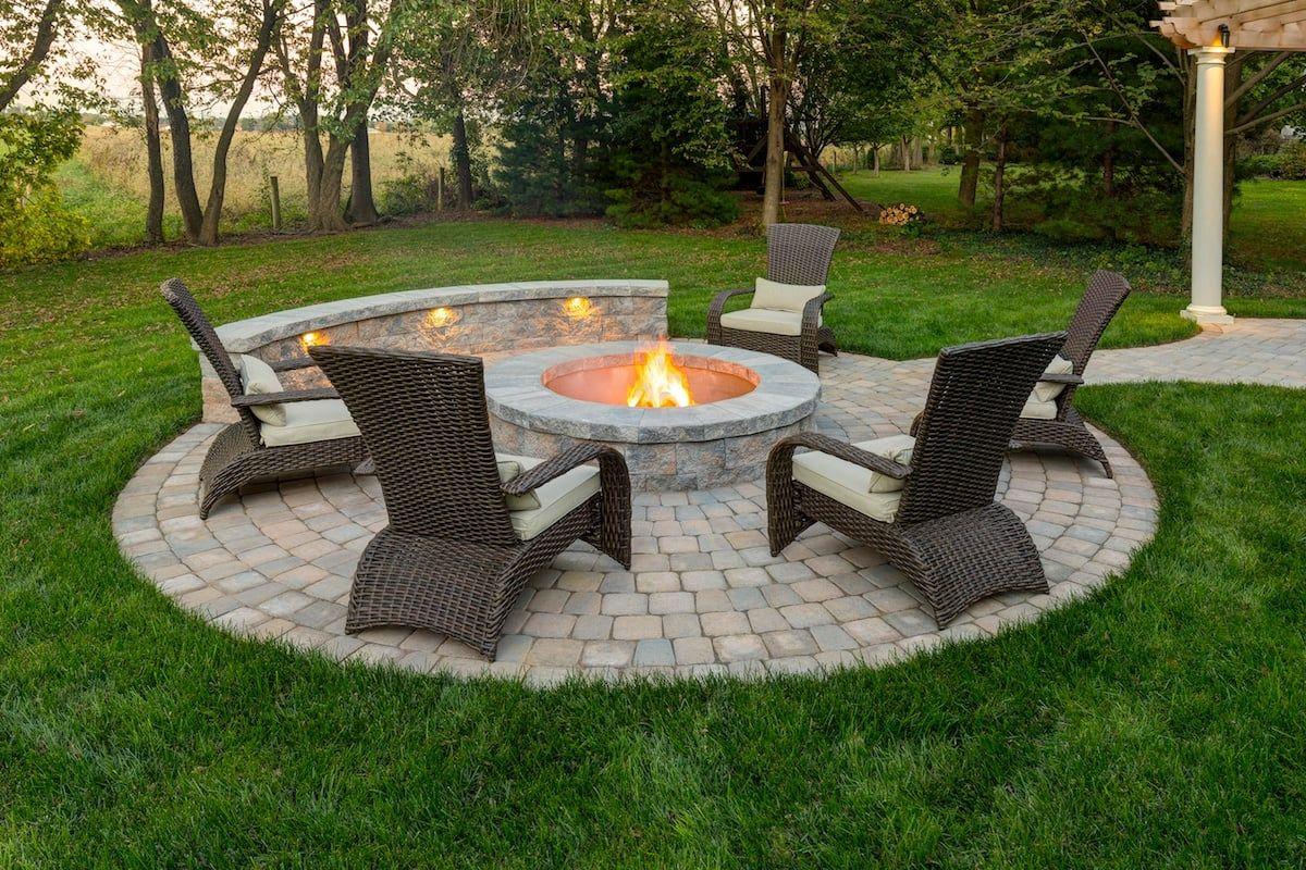 Backyard Makeovers: Firepits, Kitchens, and Lighting Trends